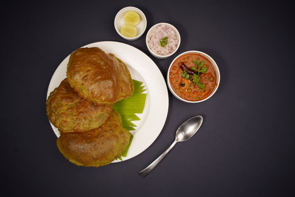 Traditional Bedmi Poori with Aloo Sabzi dish from Uttar Pradesh, India — Authentic recipe from Eat By State