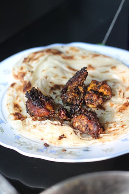 Traditional Kerala Parotta dish from Kerala, India — Authentic recipe from Eat By State